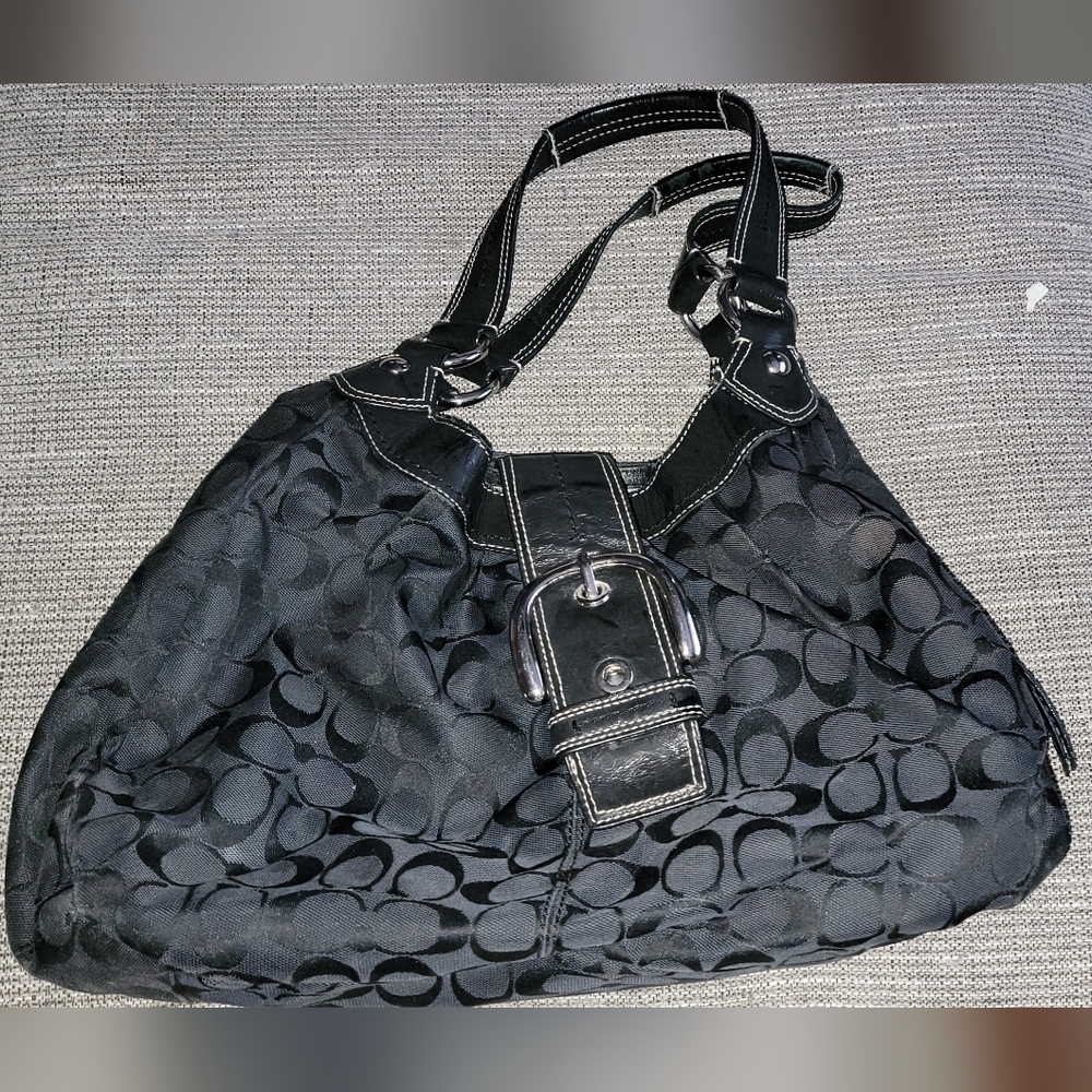 Black fabric Coach handbag